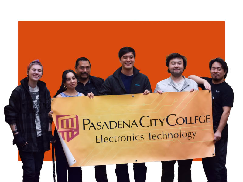 Group of Students Holding Banner