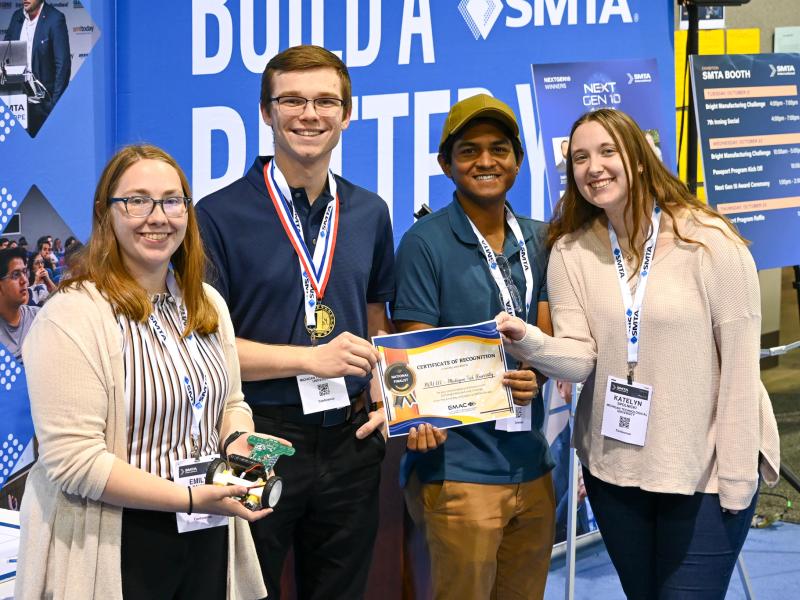 Students holding certificate
