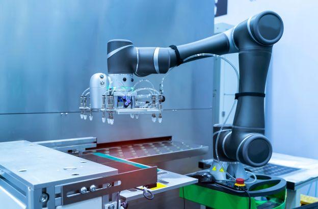 Robotic arm being used for electronics manufacturing